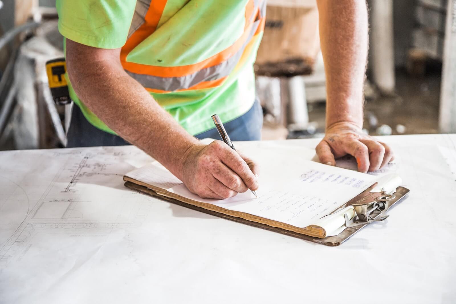 Electrician reading a blueprint.
